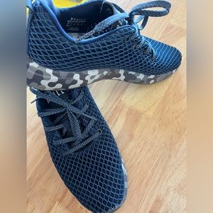 Navy blue w/ camo soles- NOBULL running shoes. Unisex.